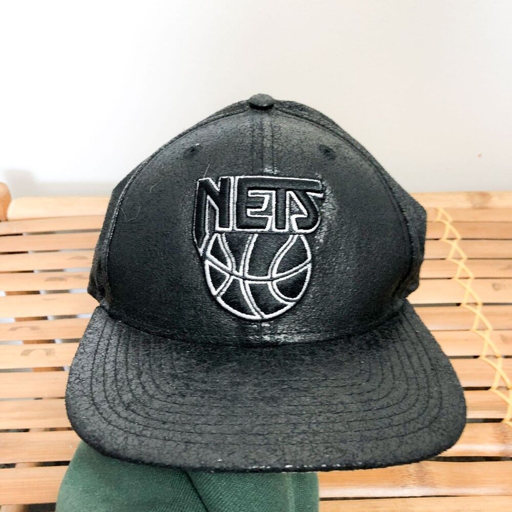 New Era Brooklyn Nets Coated Faux Leather Flat Bill Snap Back Hat